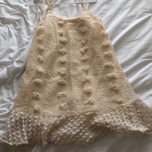 Cream dress with detail